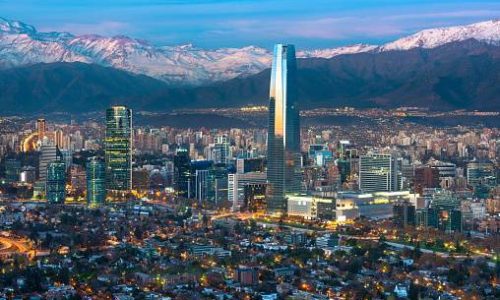 Panoramic view of Providencia and Las Condes districts with Costanera Center skyscraper, Titanium Tower and Los Andes Mountain Range, Santiago de Chile